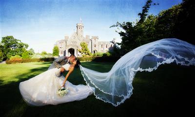 View Photo #10 - Bride and groom kissing