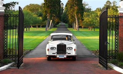 View Photo #31 - Classic white car pulling into Bourne Mansion