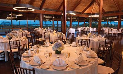 View Photo #4 - Dark wooden wedding reception room with tables 