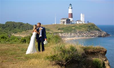 View Photo #12 - Wedding couple kissing in front of Montauk Lighthouse