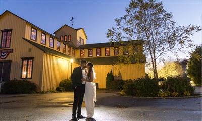 View Photo #1 - Couple in Front Of The Barn