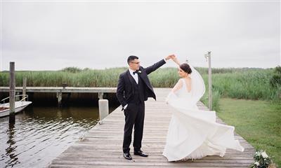 View Photo #22 - Bride and Groom on the Dock