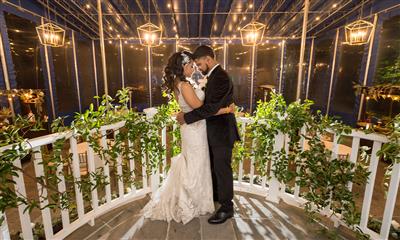 View Photo #11 - Bride and Groom Overlooking Cocktail Space
