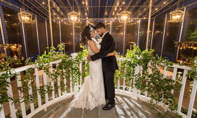 View Photo #11 - Bride and Groom Overlooking Cocktail Space