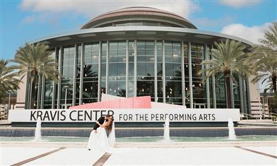View Photo #1 - Bride and Groom in Front of Kravis Center Sign
