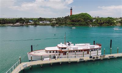 View Photo #2 - View of lighthouse with Honey Fitz on dock